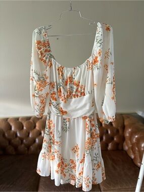 White Mini Dress with Orange Floral Print and Tie-Back